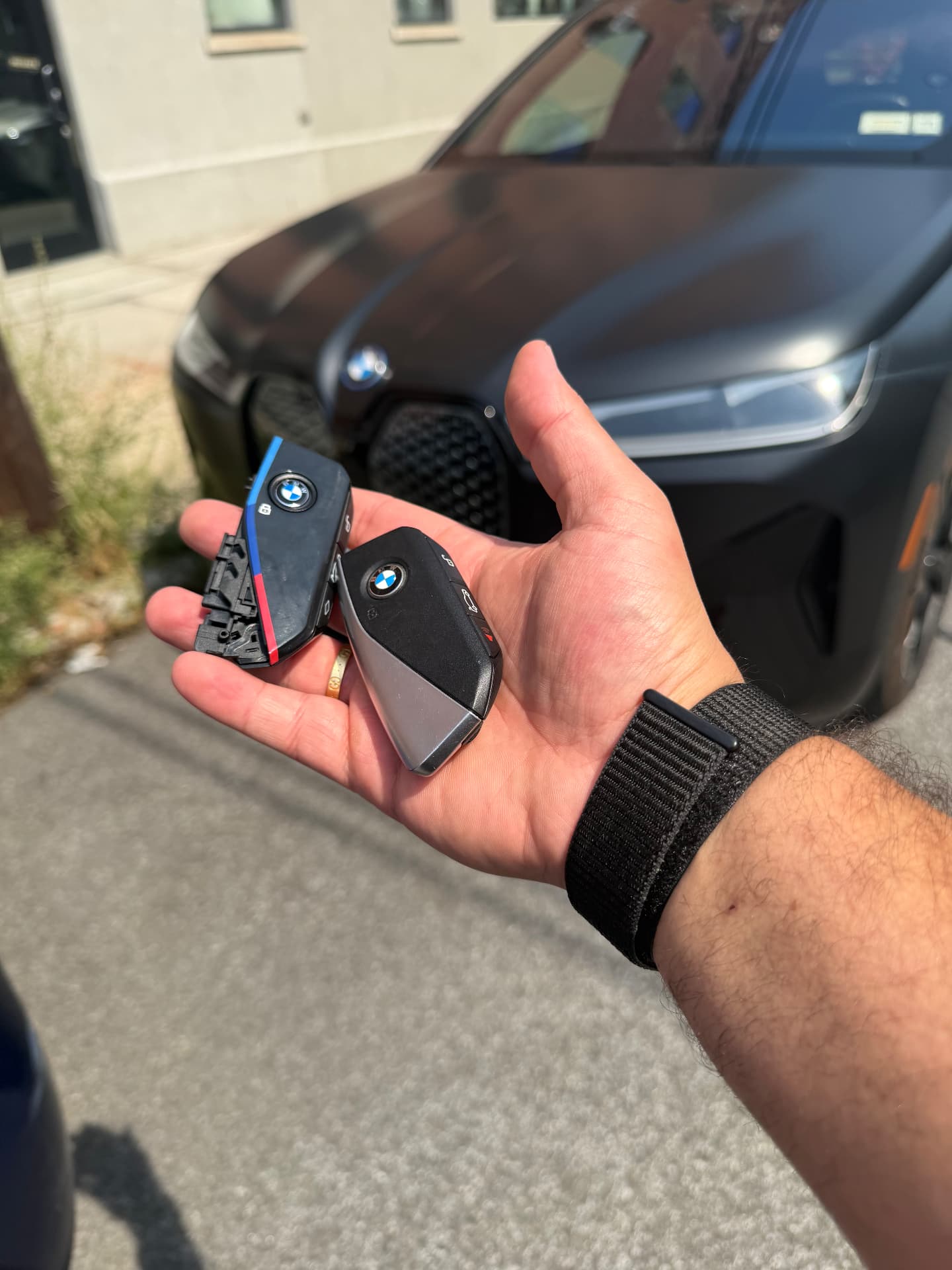 Original and replacement BMW smart keys after mobile programming